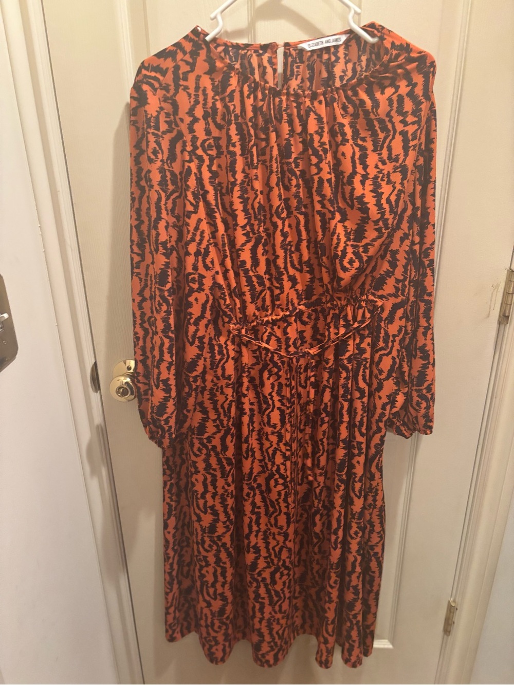 Orange and Black Printed Long Sleeve Midi Dress. Size large